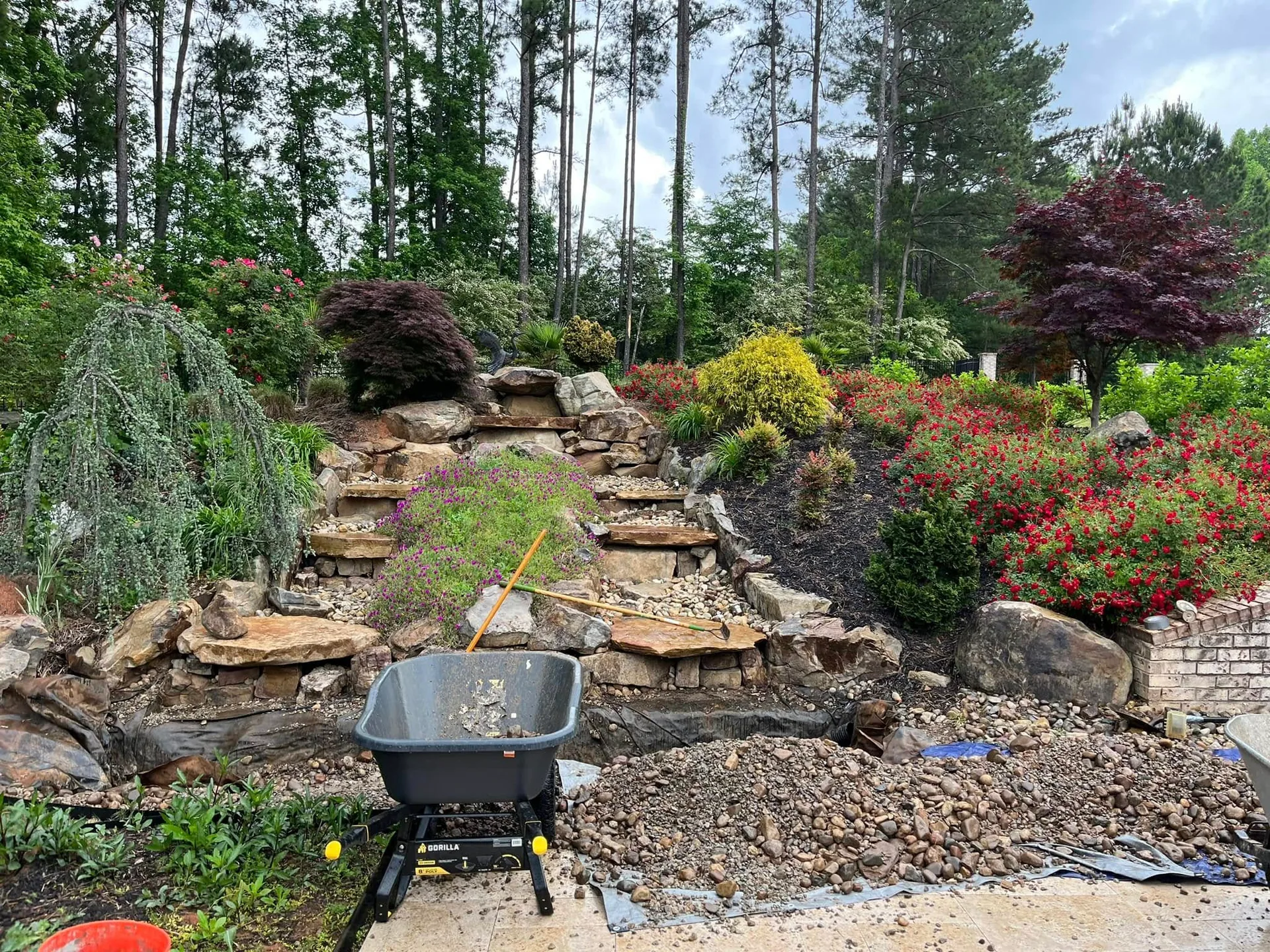 Hillside stone steps river rock install loganville
